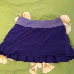 Lululemon skirt/ tennis running shorts.